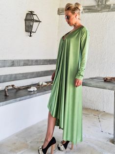 NEW Evening Maxi Dress / Pear Green Plus Size Dress / Evening Dress / Maxi Dress / Party Dress / Plus Size Dress / Open Back Dress / Summer Dress / Long Sleeve Dress / #35266 NEW 2018.... A must have maxi dress...! With long sleeves and open back cut out ! Ideal for all body-types, you can have a very elegant appearance ! - Handmade item - Materials : crystal jersey - The model wears : size - one size , color - Pear Green PLEASE NOTE : The dress is ONE SIZE but you have to choose a size from XS Green Maxi Length Long Sleeve Party Dress, Green Long Sleeve Maxi Dress For Party, Long Green Midi Dress For Evening, Green Long Sleeve Asymmetrical Party Dress, Flowy Long Sleeve Summer Party Dress, Green V-neck Party Dress For Spring, Green V-neck Spring Party Dress, Green Spring V-neck Party Dress, Green Long Sleeve Asymmetrical Dress For Spring