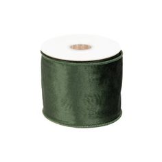 a roll of dark green satin ribbon on a white background with the edge of it