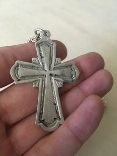 This is a vintage silver 925 unisex Christian Cross. It is hallmarked 925. It is decorated with a beautiful textured pattern. It comes with a thick silver chain. Please contact me if you want a different chain or if you don't want a chain at all! Please contact me for any inquiry you might have! Thank you for visiting Curiose Vintage Shop 🖤 Jordan Cross length: 5.5 cm/ 2.15 inches Chain total length: 48 cm/ 18.9 inches Total weight: 20 gr. It will be sent registered (A class priority) and you w Antique Nickel-free Cross Pendant Jewelry, Vintage Handmade Cross Jewelry, Handmade Vintage Cross Jewelry, Silver Etched Cross Pendant Necklace, Silver Etched Cross Pendant Jewelry, Vintage Cross Pendant Jewelry For Anniversary, Vintage Cross Pendant Necklace For Anniversary, Vintage Silver Cross Jewelry, Vintage Cross Jewelry For Anniversary