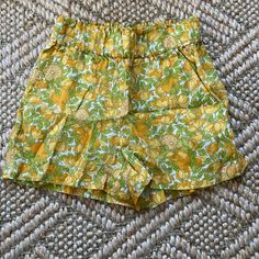 Size Xxs Brand New With Tags Fit Is Tts But Waist Is Stretchy High Rise. Front Rise: 12 1/2"; 3 1/2" Inseam. 100% Linen Pockets Machine Wash Trendy Yellow Shorts For Spring, Yellow Floral Print Vacation Bottoms, Yellow Floral Print Beach Shorts, Yellow Floral Print Shorts, Vacation Yellow Floral Print Bottoms, Spring Lemon Print Bottoms, Summer Fitted Mustard Bottoms, Fitted Mustard Summer Bottoms, Fitted Mustard Bottoms For Summer