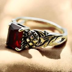 This exquisite Scottish thistle vintage simulated ruby ring is crafted in 925 solid sterling silver. The stunning princess cut ruby centerpiece measures 8x6mm, and the ring is stamped with the 925 hallmark, indicating its high quality and purity. Scottish Thistle, Beautiful Birthday, Anniversary Present, Red Band, Celtic Jewelry, Birthday Gift For Him, Ruby Ring, Princess Cut, Beautiful Rings