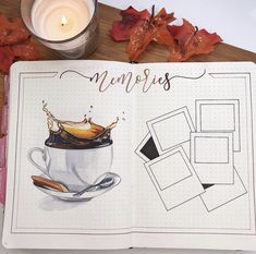 an open notebook with pictures and a candle on the table next to it, surrounded by autumn leaves