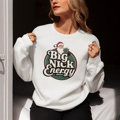 big nick energy, christmas pjs, ugly xmas sweater, ugly christmas shirt, san francisco, white elephant gift, new year shirt, funny christmas gift, ugly sweater, graphic sweatshirt, friend christmas, christmas pajamas, funny christmas, christmas sweatshirt, womens sweatshirt, lounge wear, friend gift, HOW TO ORDER: 1- Please check all of the photos. 2- Select your T-shirt size from selection box. 3- Select your T-shirt color from the selection box. 4- Personalization box is only for design color White Funny Print Winter Sweatshirt, White Sweatshirt With Funny Print For Winter, White Winter Sweatshirt With Funny Print, Christmas Cotton Sweater For Streetwear, Big Nick Energy, Sweater Graphic, Ugly Xmas Sweater, Ugly Christmas Shirts, Santa Shirt