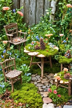 a miniature garden with chairs and tables in it