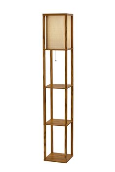 Have it all with style and multi-function. The Wright shelf floor lamp features a walnut wood finished open box frame with two additional display/storage shelves, making it a handy addition to the living/media room, den, office, or bedroom. The square natural textured shade diffuses light from a 150 Watt incandescent or equivalent bulb. The lamp has on/off functionality with a metal ball accented pull chain switch. This lamp has a clear cord and is smart outlet compatible. The lamp comes with clear wire clips for a clean look. Bulb is not included. Adesso Wright 63-in Natural Wood Veneer On Mdf Shelf Floor Lamp | 3138-12 Shelf Floor Lamp, Den Office, Metal Ball, Display Storage, Pull Chain, Media Room, Open Box, Walnut Wood, Storage Shelves