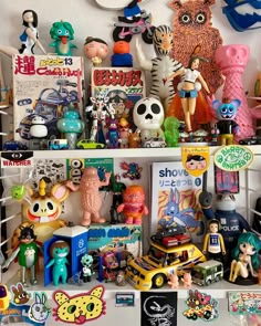 there are many toys on the shelves in this room