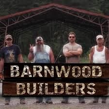 a group of men standing next to each other in front of a wooden sign that says barnwood builder