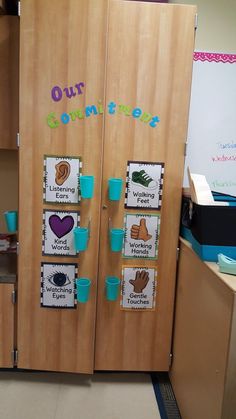 two wooden lockers with pictures on them in a classroom setting, one has writing and the other has reading material