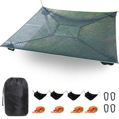 an image of a tent set up on the ground with other items to make it look like