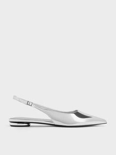 Silver Metallic Pointed-Toe Slingback Flats | CHARLES & KEITH Sleek Pointed Toe Slingback Sandals, Sleek Evening Flats For Spring, Trendy Flat Heel Slingback Pumps For Formal Occasions, Modern Flat Slingback Pumps For Formal Occasions, Spring Silver Pointed Toe Flats, Sleek Pointed Toe Flats For Spring Evening, Sleek Pointed Toe Flats For Evening In Spring, Modern Flat Heel Slingback Pumps, Elegant Spring Pointed Toe Flats With Metal Feet