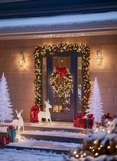 christmas decorations in front of a house decorated for the holidays