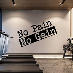 an exercise room with no pain, no gain wall decal in black and white