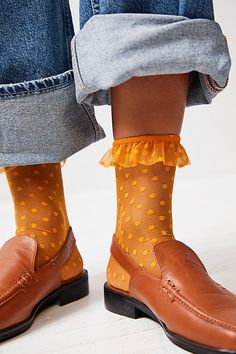 So fun and femme, these dainty socks are featured in a sheer, polka dot fabrication with sweet ruffle trim. **Fit:** Ankle length **Features:** Sheer mesh fabrication, seamed toe, polka dot pattern, ruffle trim **Why We | Only Hearts Ruffle Socks at Free People in Orange, Size: M/L Mules And Socks, Sheer Socks With Loafers, Dress With Socks Outfit, Sock Product Photography, Fun Socks Outfit, Dainty Socks, Sock Shoes Outfit, Sheer Socks Outfit, Colorful Tights Outfit