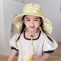 Keep your little ones safe and stylish in the sun with our super new, luxurious wide-brimmed Beach Summer Hat for Kids. Designed with both boys and girls in mind, this colorful hat is perfect for any summer adventure. Specifications: Wide-brimmed sunshade hat with an adjustable drawstring behind the head to provide a secure and comfortable fit. Soft and foldable design for easy packing and carrying. Breathable lining inside the hat to keep your child cool and comfortable. High-quality cotton fab Playful Brimmed Sun Hat For Play, Playful Brimmed Bucket Hat For Play, Summer Play Brimmed Bucket Hat, Summer Brimmed Bucket Hat For Play, Playful Brimmed Sun Hat, Casual Summer Hats For Play, Cute Adjustable Summer Hat, Playful Brimmed Bucket Hat, Cute Summer Hat With Adjustable Fit