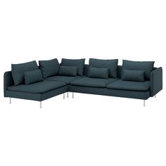 a large sectional couch with pillows on it's back and arms, in front of a white background