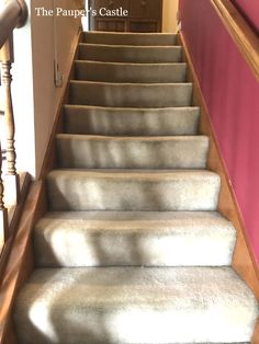 the carpeted stairs are clean and ready for us to go down them into the house