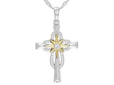 Bella Luce ® white diamond simulant 0.32ctw round, rhodium over sterling silver with accents of 18k yellow gold cross pendant with chain. Measures approximately 1.31"L x 0.75"W and has an 18" singapore chain with a 2" extender and lobster claw closure. The diamond equivalent weight is 0.15ctw. Sterling Silver Cross Pendant, Silver Cross Pendant, Gold Cross Pendant, Diamond Simulant, Man Made Diamonds, Broken Chain, Sterling Silver Cross, Gold Cross, Silver Cross