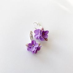 Delicate Purple Flower Jewelry, Delicate Purple Flower Earrings, Purple Flower-shaped Handmade Jewelry, Handmade Purple Flower-shaped Jewelry, Purple Flower-shaped Jewelry With Handmade Flowers, Purple Flower Jewelry With Handmade Flowers, Purple Flower Jewelry With Handmade Details, Lavender Flower-shaped Jewelry With Flower Charm, Lavender Flower Charm Jewelry