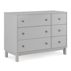 a grey dresser with six drawers