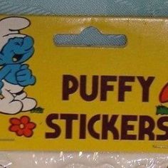 the smurfs stickers are on display in plastic wrapper bags, and they look like they're from the smurfs