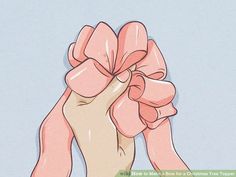 a person's hands holding a pink bow