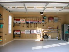 a garage with lots of tools and signs on the wall