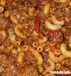 closeup of pasta with meat and sauce in a pan