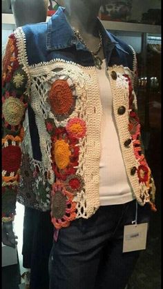 a crocheted jacket on display in a store