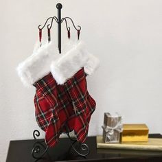 a christmas stocking holder on a table