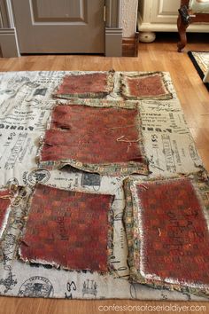 an area rug with multiple pieces of fabric on it