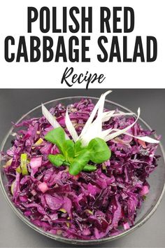 red cabbage salad in a glass bowl with text overlay that reads polish red cabbage salad recipe