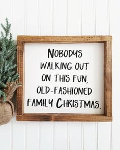 a wooden sign that says nobody's walking out on this fun old - fashioned family christmas