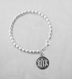 "Sterling Silver Bead Bracelet with Engrave Circle Pendant. we can say... simplicity, best...ever, 5 mm,6 mm, 8mm thickness bead, Solid silver disc, 22 years monogram expertise we like to share with you.. \"this is one of buyers review on Aug 10 2020 First of all, I placed my order on Thursday and I got it Monday afternoon (this was very fast considering I ordered something else from Etsy the same day) I live in upstate New York, by the w Thank you for your fast service. Second, thank you for th Classic Charm Bracelet With Adjustable Round Beads, Classic Charm Bracelet With Round Beads, Classic Adjustable Charm Bracelet With Round Beads, Sterling Silver Charm Bracelet With Round Beads For Everyday, Classic Adjustable Beaded Bracelets, Nickel Free, Personalized Sterling Silver Bracelets With Round Beads, Sterling Silver Charm Bracelet With Round Beads, Hypoallergenic Sterling Silver Charm Bracelet With Round Beads, Silver Name Bracelet With Round Beads For Everyday