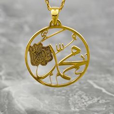 Crafted with exquisite detail and reverence, the Muhammad Written Necklace transcends mere jewelry to embody a sacred symbol of faith. Made of lustrous 925 sterling silver and elegantly plated with 18K gold, this Arabic pendant exudes timeless elegance. For Muslim women seeking a meaningful accessory, this necklace serves as a heartfelt gesture or a personal keepsake. Perfect for everyday wear or special occasions, it seamlessly merges spirituality with style. Embrace the beauty and significance Traditional Nameplate Jewelry, Traditional Gold Nameplate Necklace, Gold Plated Spiritual Medallion Jewelry, Gold Sterling Silver Spiritual Jewelry, Spiritual Gold Sterling Silver Jewelry, Sterling Silver Medallion For Blessing Occasion, Gold Plated Spiritual Jewelry For Blessing, Amulet Style Jewelry With Polished Finish As Gift, Traditional Gold Personalized Necklaces