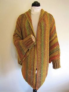 a knitted cardigan is displayed on a mannequin's dummy with the caption ravely click & easy crochet