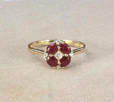 14k Yellow Gold Ruby Ring, Natural Ruby and Diamond Stylish Ring, July Birthstone Ring, Natural Ruby Jewelry, Minimalist, Creative Design Beautiful Handcrafted Multiple stone prong setting Ruby Ring in 14K Yellow Gold. Rubies are beautiful red coloured and looks very lovely when wore on fingers. Rubies are 0.98 cts approx in weight and are prong setted along with accented diamonds to give a perfect shaped to the ring. Dazzle wearing the ring on several occasions and make eyes turn to you. Weddin Gold Ruby Ring, July Birthstone Ring, Ruby Ring Gold, Jewelry Minimalist, Stylish Rings, Red Gemstones, Red Diamond, Ruby Jewelry, July Birthstone