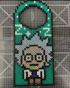 a cell phone case made out of perler beads with a cat design on it