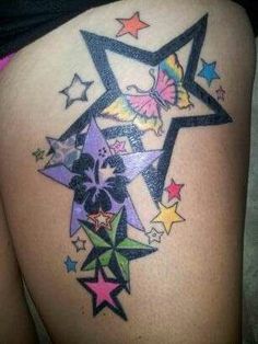 a woman's thigh with colorful stars on it