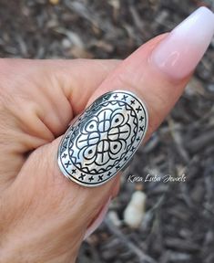 bohemian ring - Bali Sterling silver ring, womens statement ring - thumb ring - boho - concaved - native Top of ring height: 30.7mm Top of ring width: 19mm Band width: 5.5mm Shank width: 3.2mm Metal: 925 sterling silver Plating: rhodium plated Finish: high polish Stamped 925 Nothing but the best from my custom jewelry store. Email me if you have any questions. Adjustable Silver Dome Ring, Bohemian Silver Jewelry Stamped 925, Bohemian Metal Promise Ring, Silver Bohemian Open Ring Jewelry, Unique Open Ring For Festival, Bohemian Silver Round Rings, Nickel Free Silver Rings For Festival, Bohemian Silver Midi Rings, Nickel-free Silver Rings For Festival