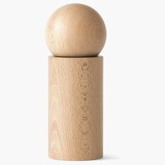 a wooden salt and pepper shaker on a white background