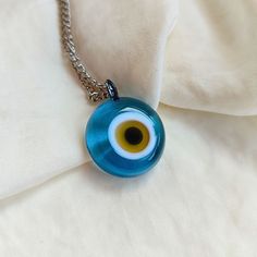 Evil Eye Necklace, Blue Unique Evil Eye Charm, Brown Nazar Necklace, High Quality Glass Evil Eye Jewelry, Handmade Protection Choker Gift Evil eye protection is an ancient belief that helps to protect its owner from jealous eyes. It brings good luck. Also some cultures believe that evil eye necklace brings good health. I hope wearing this jewelry helps your stress, struggles in your daily life <3 All of the glass evil eyes have their own shape, they are handmade and unique. It is a high quality Blue Amulet Necklace As Gift, Blue Amulet Necklace For Gift, Handmade Light Blue Spiritual Necklaces, Handmade Blue Glass Necklaces, Blue Glass Spiritual Necklaces, Traditional Blue Glass Necklaces, Nazar Necklace, Glass Evil Eye, Evil Eyes