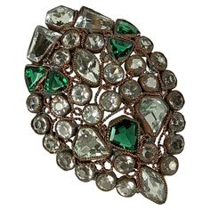 Art Deco Hobe Jeweled Clip from the 1920's with sterling clip fitting. Crystal and emerald pastes in varied cuts are set in typical Hobe setting in a marquise shaped clip. 1920's USA. Unsigned, Clip signed Sterling. Measures 2" x 1 3/8". 1920s Jewelry, Brooches, Emerald, Art Deco, Clip Art, Signs, Crystals, For Sale, Pins