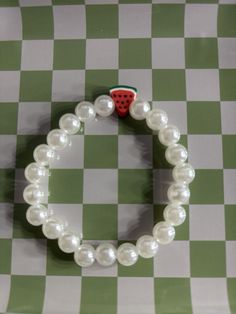 The Watermelon Pearls Bracelet is a bracelet woth pearls and a watermelon charm Watermelon Bracelet, Pearls Bracelet, A Bracelet, Pearl Bracelet, Watermelon, Jewelry Bracelets, Beaded Bracelets, Ships, Bracelet