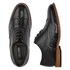 For style and versatility, you can't go wrong with a wingtip. This updated classic features intricate perfing details on the wing and collar and a stylish stacked heel. Even if you have to tie the shoe for him, the Stacy Adams Dunbar Wingtip Oxford will have any boy looking like the man of the house.Features: ComfortClosure Type: Lace-UpShoe Heel Height: FlatUpper/Outer Base Material: 100% PolyuretheneShoe Lining Material: SyntheticSole Material Content: 100% RubberToe Type: Wing TipCare: Spot C Classic Oxfords With Perforated Toe Box And Flat Heel, Formal Wingtip Dress Shoes With Perforations, Formal Wingtip Lace-up Shoes With Perforations, Wingtip Dress Shoes With Perforations For Workwear, Classic Wingtip Dress Shoes For Spring, Classic Dress Shoes With Perforations For Work, Shoes Oxford, Man Of The House, House Features