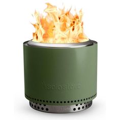 a green portable stove with flames coming out of it's top and bottom lid