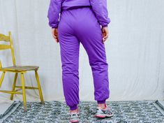 "AUNT GERTRUDE PRESENTS - vintage 90's purple tracksuit - brand: Skis Dynastar - lined, insulated - material: 100% cotton CONDITION (1-10 ❶❷❸❹❺❻❼❽ Good vintage condition SIZE/MEASUREMENTS size from label: XL TOP chest: 52 inches (132 cm) length: 23,5 inches (60 cm) sleeve length from armpit: 18 inches (46 cm) PANTS waist: 33-40 inches (84-102 cm) elastic waist hips: 44 inches (112 cm) rise: 12 inches (31 cm) length: 40 inches (101 cm) inseam: 30 inches (76 cm) The model is 5'9\" (174 cm), measur Purple Relaxed Fit Sweatpants For Athleisure, Purple Athleisure Sweatpants With Elastic Waistband, Purple Athleisure Joggers For Loungewear, Purple Relaxed Fit Sporty Sweatpants, Sporty Purple Sweatpants For Sports, Winter Joggers Fitted For Jogging, Winter Tracksuit Relaxed Fit For Gym, Fitted Winter Joggers For Jogging, Sporty Stretch Joggers For Winter