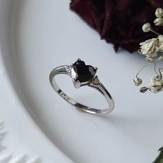 A gorgeous black onyx heart ring. Made with sterling silver and cubic zirconia gems. Multiple sizes available. Black Diamond Ring Engagement, Black Diamond Ring, Black Onyx, Black Diamond, Sterling Silver Ring, Heart Ring, Silver Ring, Onyx, Sterling Silver Rings