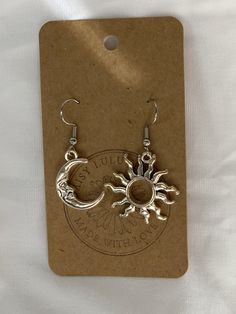 "Hypoallergenic stainless steel hook Sun and Moon Earrings, dangle earrings, eco-friendly packaging MATERIALS: - Earring Fixture: 316L Surgical Stainless Steel, hypoallergenic and tarnish resistant! - Sun and Moon: Nickel Free and Lead Free Metal. WORLDWIDE SHIPPING! ECO-FRIENDLY PACKAGING! Get 10% off when you purchase 2 or more items with the code \"EXTRA10\" at checkout!" Witchy Friends, Sun And Moon Earrings, Piercing Inspo, Jewelry Accessories Ideas, Moon Earrings