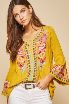 We love the vibe of this gorgeous embroidered top. It features a split V-neckline, colorful embroidery, bell sleeves and a relaxed a-line fit with flowy bodice. Pair this up with skinny jeans and booties for a chic look! Small Bust 40" L 27" : Medium Bust 42" L 27" : Large Bust 44" L 27" 1X Bust 52" L 29" : 2X B 54" L 29" : 3X Bust 56" L 29" 100% Woven Rayon - no stretch Hand wash cold Colorful Embroidery, Footless Tights, Leopard Sweater, Embroidered Clothes, The Vibe, Kimono Jacket, Woven Top, Embroidery Details, Large Bust