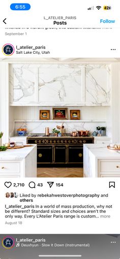 an instagramted photo of a kitchen with white cabinets and marble counter tops on the bottom right corner